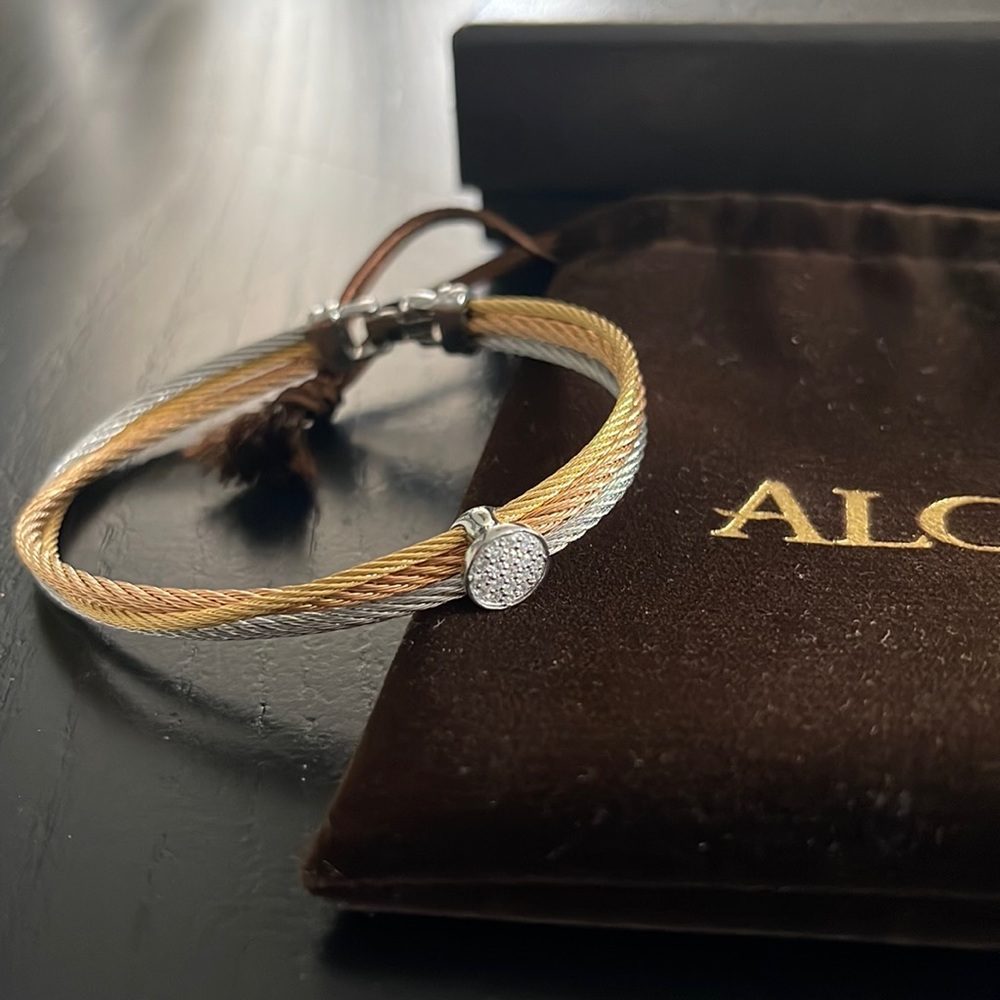 Alor Assymetrical rose gold, gold and silver cable bracelet with diamonds.